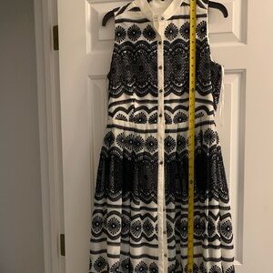 Katherine Kelly dress.  Navy blue and white with silver buttons.